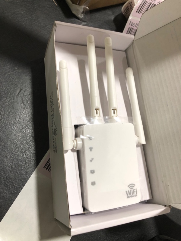 Photo 1 of WiFi Extender, WiFi Extender Signal Booster Dual-Band(5.8G&2.4G) Wireless Repeater Coverage to 12880 sq. ft & 105 Devices, 1-Tap Setup, Supports Ethernet Port, Faster Speed