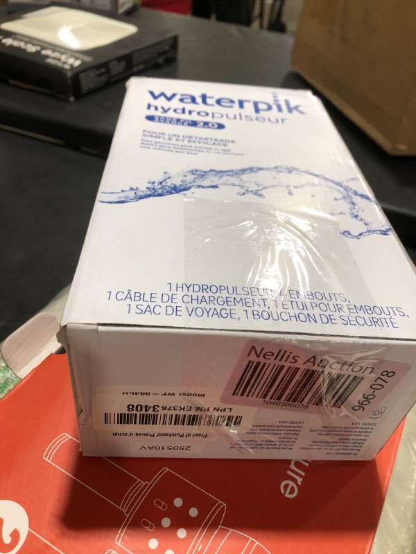 Photo 1 of Waterpik Cordless Advanced 2.0 Water Flosser For Teeth, Gums, Braces, Dental Care With Travel Bag and 4 Tips, ADA Accepted, Rechargeable, Portable, and Waterproof, Blue WP-583, Packaging May Vary