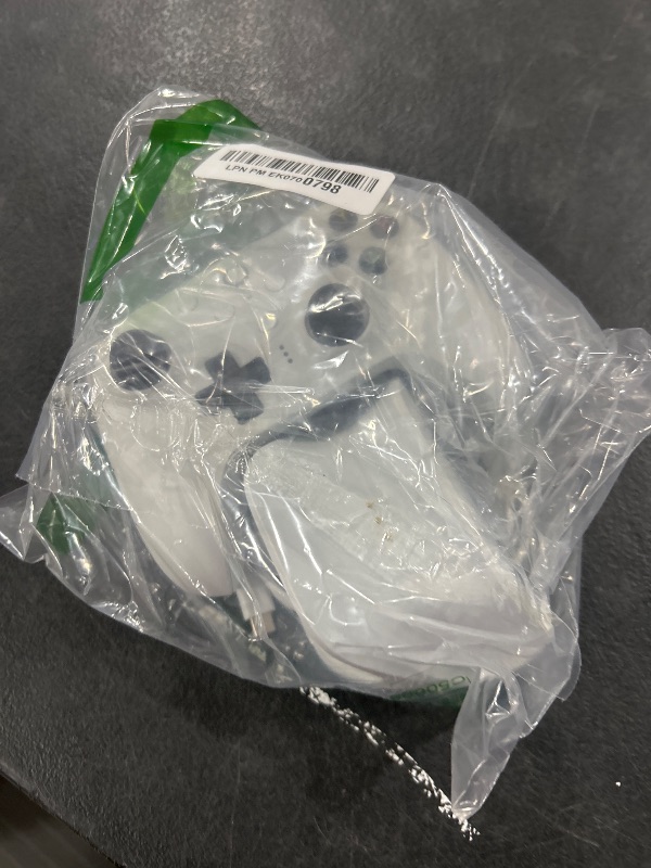 Photo 1 of 8Bitdo Ultimate 2 Wireless Gaming Controller with TMR Joysticks, Switchable Hall Effect/Tactile Triggers, 8Speed Wireless Tech, Charging Dock, RGB Fire Ring for PC & Android - White