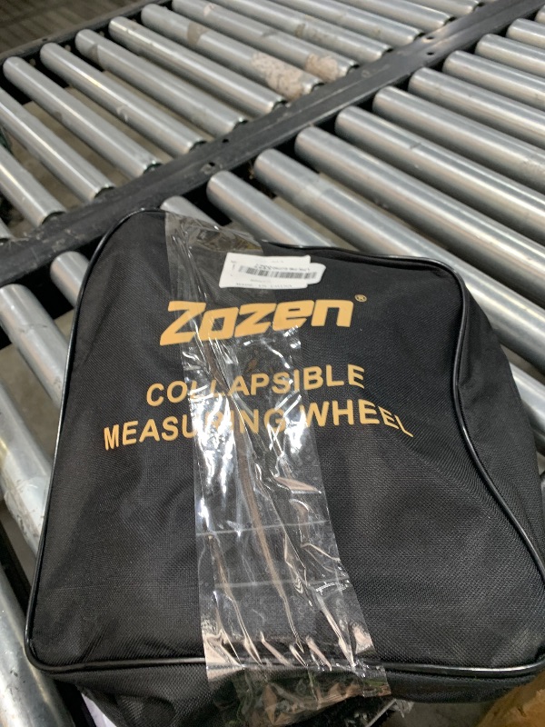 Photo 1 of Zozen Measuring Wheel in Feet and Inches, Mechanical/Double Collapsible/One Key to Reset/Kickstand to Keep Stand/Starting Point Arrow and Cloth Carrying Bag, 0-9,999 Ft Measure Wheel.