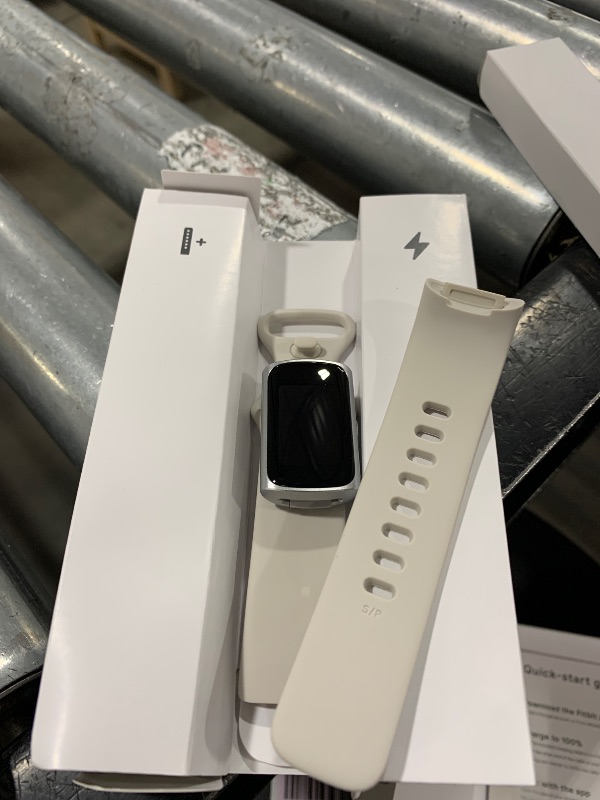 Photo 1 of Fitbit Charge 6 Fitness Tracker with Google apps, Heart Rate on Exercise Equipment, 6-Months Premium Membership Included, GPS, Health Tools and More, Porcelain/Silver, One Size (S & L Bands Included)