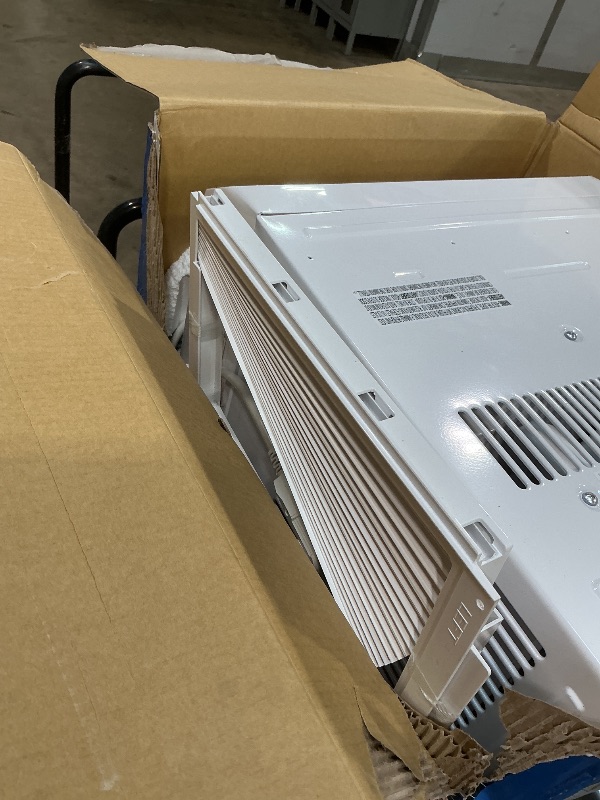 Photo 1 of ***FOR PARTS / NON-FUNCTIONAL/ BOX DAMAGED*** Midea 12,000 BTU Window Air Conditioner with Heat, 550 Sq Ft