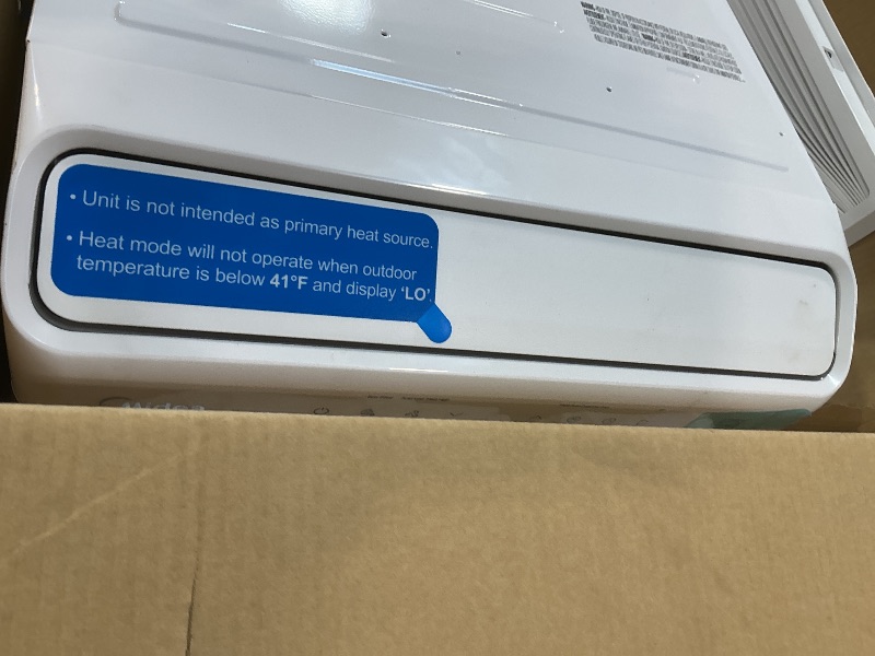 Photo 1 of ***FOR PARTS / NON-FUNCTIONAL/ BOX DAMAGED*** Midea 12,000 BTU Window Air Conditioner with Heat, 550 Sq Ft