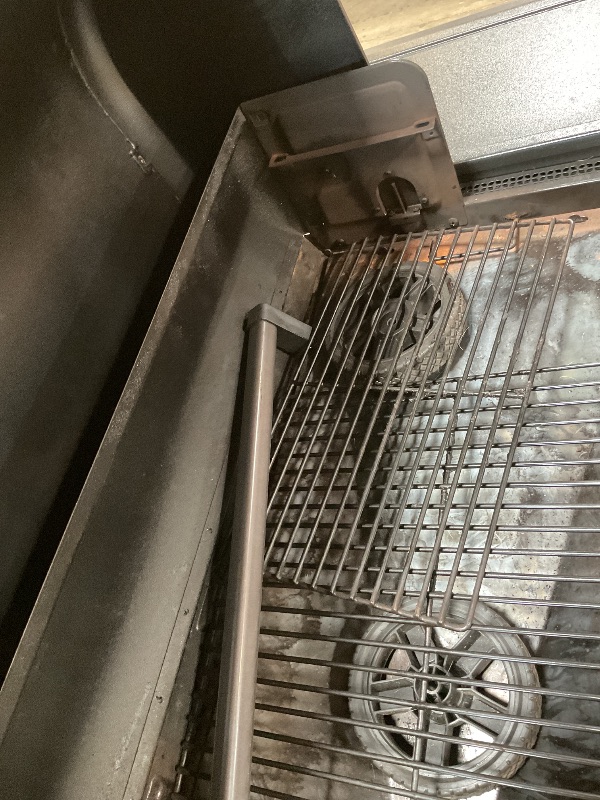 Photo 1 of ** some parts need assembly. Missing hardware for wheels. Brake on one of the wheels is broken.**Traeger Woodridge Pro Wood Pellet Grill & Smoker