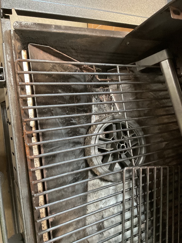 Photo 1 of ** some parts need assembly. Missing hardware for wheels. Brake on one of the wheels is broken.**Traeger Woodridge Pro Wood Pellet Grill & Smoker