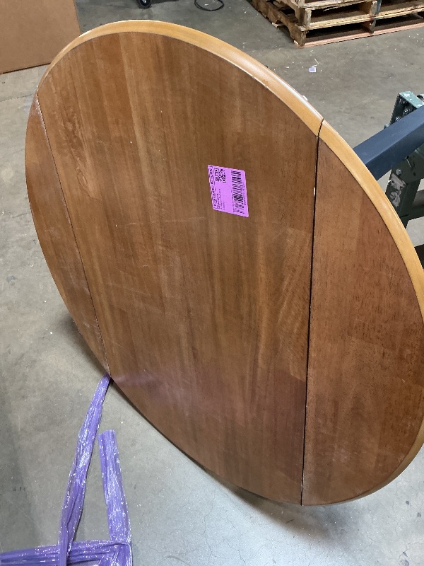 Photo 1 of *** CHIPS IN THE WOOD ***Signature Design by Ashley Drop Leaf Dining Table