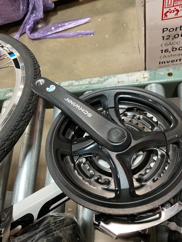Photo 1 of *** PIECES MUST BE ASSEMBLED WHITE COLOR REFER TO NELLIS PHOTO ***Schwinn Network 1 Hybrid Bike, 700c Mens and Womens Bike, 21-Speed Hybrid Bicycle, Aluminum Frame, Suspension Fork, Alloy Linear Pull Brakes, Adult Bicycle