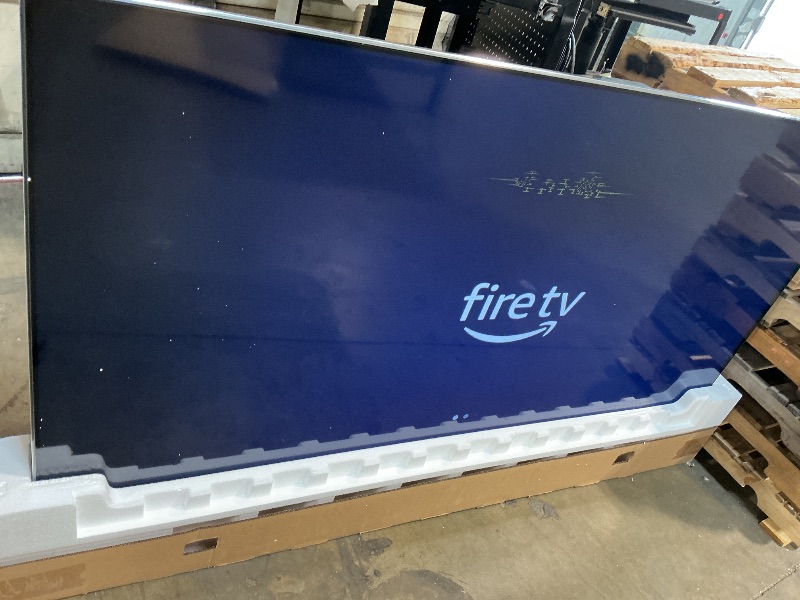 Photo 1 of ***PIXELATED DAMAGE SEE PICTURES***Amazon Fire TV 75" Omni QLED Series 4K UHD smart TV, Dolby Vision IQ, Fire TV