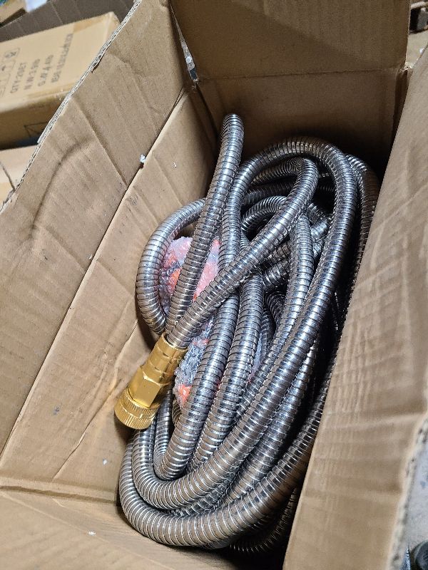 Photo 1 of Giraffe Tools Garden Hose 100ft x 5/8", 304 Stainless Steel Metal Water Hose, No Kink Garden Water Hose with 9 Pattern Spray Nozzle, Flexible, Lightweight, Kink Free Hose for Yard, Outdoor