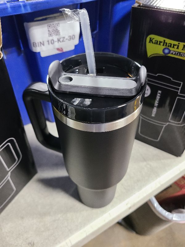 Photo 1 of Quencher Era 40oz Tumbler with Handle and Straw – Quencher H2.0 Stainless Steel Insulated Tumbler for Water, Iced Coffee, Tea, and More, Lilac, water bottle, insulated water bottle