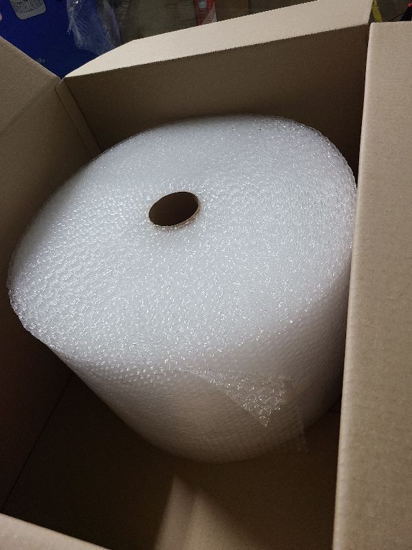 Photo 1 of Amazon Basics Perforated Bubble Cushioning Shipping Wrap, Small 3/16", 12 inch x 175 ft Long Roll, Clear