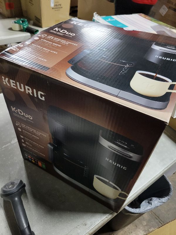 Photo 1 of Keurig K-Duo Single Serve K-Cup Pod & Carafe Coffee Maker, with Multiple Brew Sizes, 60oz Removable Reservoir, Programmable Auto Brew Carafe, (Gen 1), Black