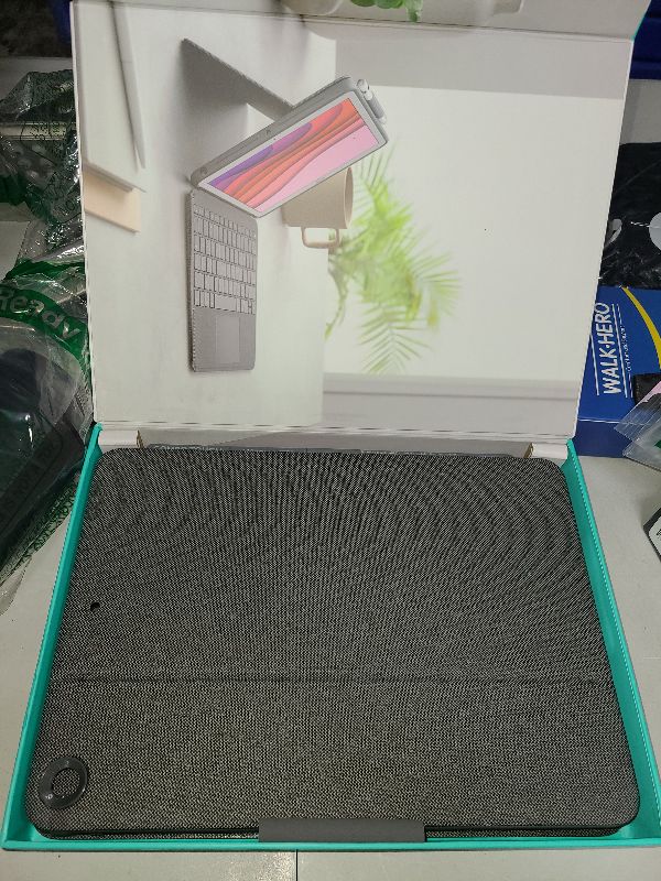 Photo 1 of Logitech Combo Touch, Detachable iPad Keyboard Case (10th gen and A16) with Large Precision Trackpad, Full-Size Backlit Keyboard, and Smart Connector Technology - Oxford Gray