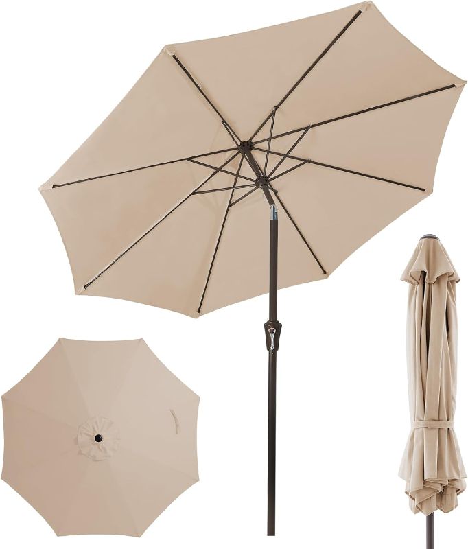 Photo 1 of JEAREY 10FT Outdoor Patio Umbrella Outdoor Table Umbrella with Push Button Tilt and Crank, Market Umbrella 8 Sturdy Ribs UV Protection Waterproof for Pool, Garden (Black White Stripe)
