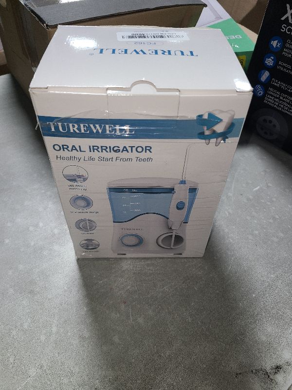Photo 1 of TUREWELL FC162 Water Dental Flosser for Teeth/Braces,10 Pressure Levels, 8 Water Jet Tips for Family, 600ML Electric Water Dental Oral Irrigator for Teeth Clean (White)