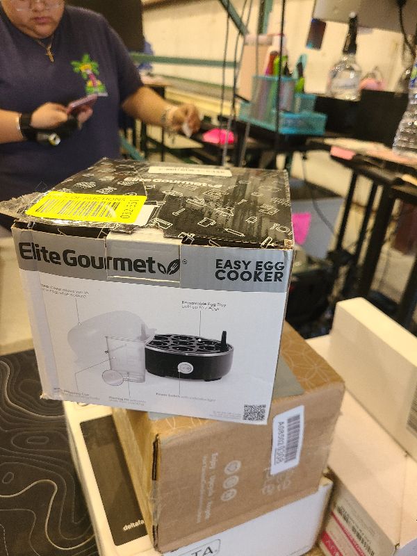 Photo 1 of Elite Gourmet EGC115B Easy Egg Cooker Electric 7-Egg Capacity, Soft, Medium, Hard-Boiled Egg Cooker with Auto Shut-Off, Measuring Cup Included, BPA Free, Classic Black