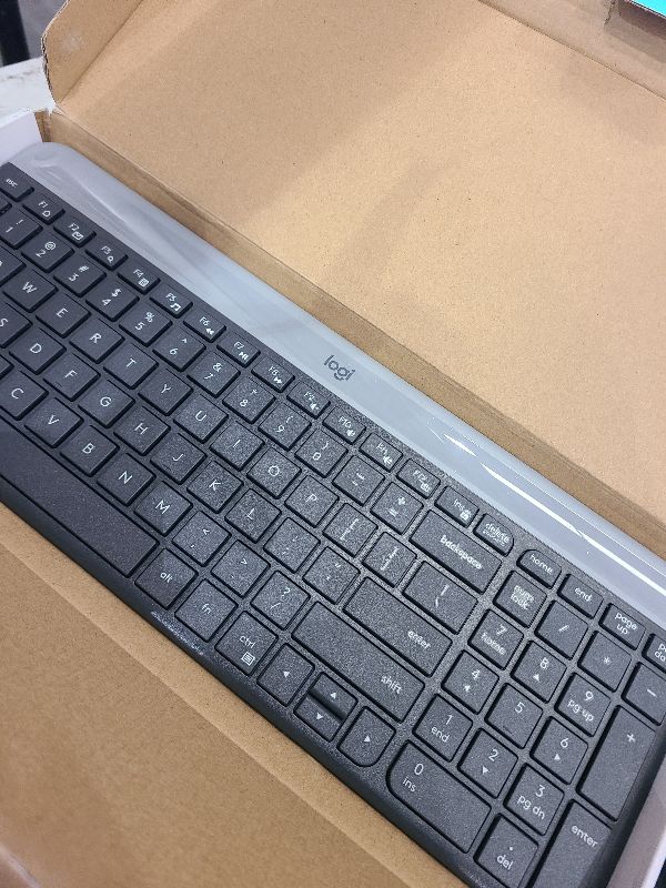 Photo 1 of Logitech MK470 Slim Wireless Keyboard and Mouse Combo - Modern Compact Layout, Ultra Quiet, 2.4 GHz USB Receiver, Plug n' Play Connectivity, Compatible with Windows - Graphite