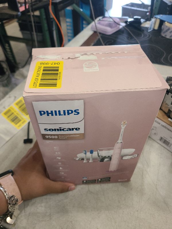 Photo 1 of Philips Sonicare DiamondClean Smart 9500 Electric Toothbrush, Sonic Toothbrush with App, Pressure Sensor, Brush Head Detection, 5 Brushing Modes and 3 Intensity Levels, Pink, Model HX9923/21