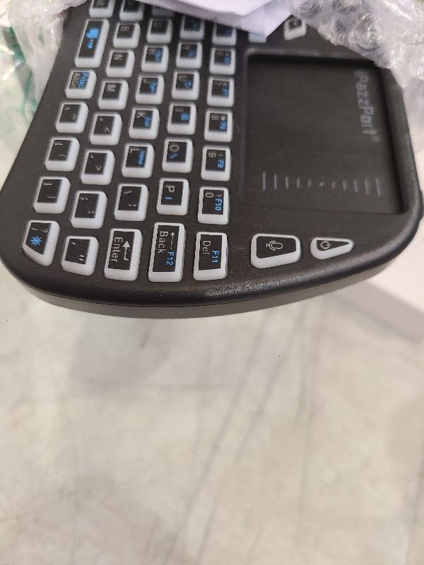 Photo 1 of iPazzPort Small Bluetooth Keyboard with Touchpad, 2.4Ghz Mini Wireless Keypad with IR Learning, Essential Home Keypad Mouse Combo, RGB Backlight, Rechargeable, for PC, Smart TV, Laptop?Android TV Box