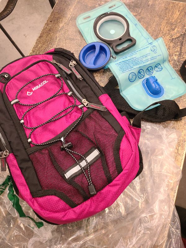 Photo 1 of 15L Insulated Hydration Backpack Pack with 2L Water Bladder Lightweight Hiking Backpack Bag for Women Men Daypack for Hiking Running Festival Camping Biking (Purple)