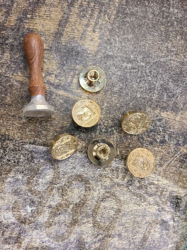 Photo 1 of Animal Wax Seal Stamp Set with 7 Removable Brass Heads and 1 Wooden Handle - Dragon, Mermaid, Peacock, Cat Designs for Wedding Invitation Envelopes