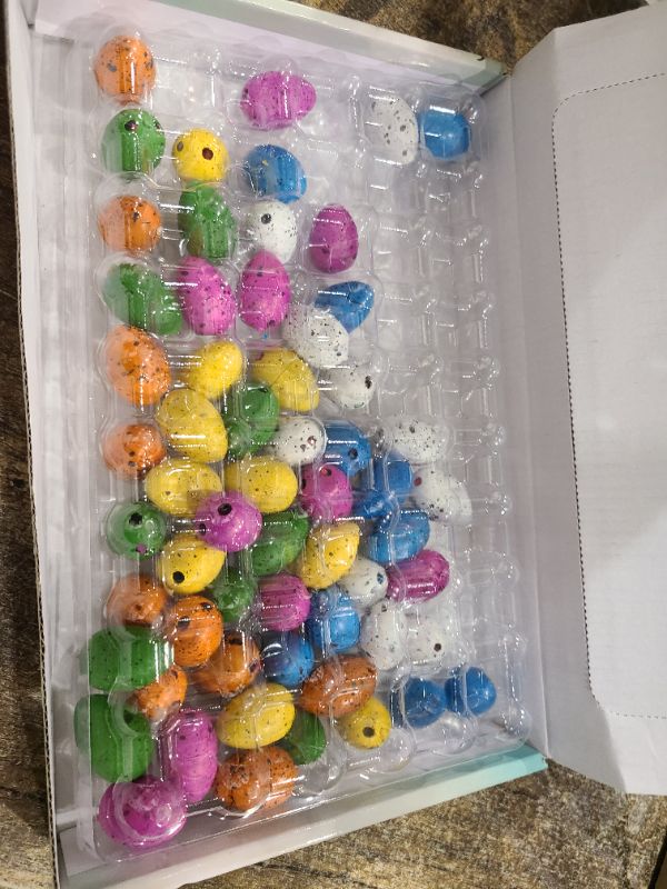 Photo 1 of 60PCS Small Hatching Dinosaur Eggs for Dinosaur Party Favors Birthday Goodie Treat Bag Stuffers Classroom Carnival Prizes Box Toys Bulk Pinata Fillers Novelty Grow in Water Dino Eggs with Toys Inside