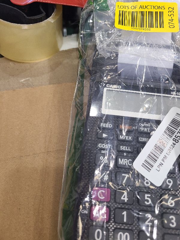 Photo 1 of  Calculator | Portable | 12-Digit Display | One-Color Printer | Tax & Currency | Bookkeeping & Accounting Tasks