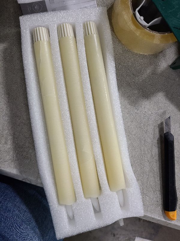 Photo 1 of AFINETH Flameless Taper Candles, 9.6" Real Wax Battery Operated, 3 Pack Led Candles with 3D Wick, Flickering, Ivory
