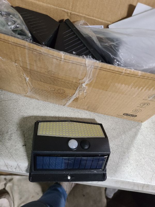 Photo 1 of [6 Packs] Solar Lights Outdoor Motion Sensor Solar Security Lights Waterproof with 3 Lighting Modes Solar Powered Wall Lights Outside for Garden Fence Yard Deck