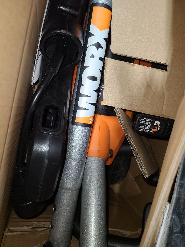 Photo 1 of WORX WG896 12 Amp 7.5 Inch Electric Lawn Edger & Trencher, Orange and Black