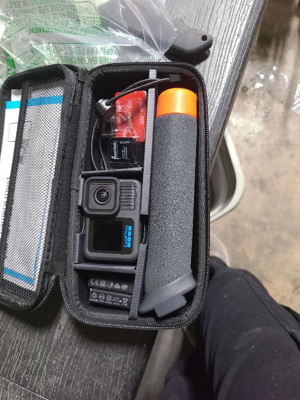 Photo 1 of **MISSING PIECES**
GoPro HERO13 Black Accessory Bundle - Includes The Handler, 2 Enduro Batteries, 2 Curved Adhesive Mounts, 64GB SanDisk MicroSD Card, and Carrying Case