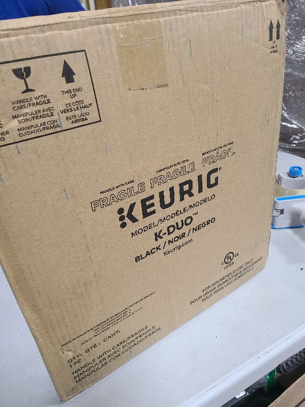 Photo 1 of Keurig K-Duo Single Serve K-Cup Pod & Carafe Coffee Maker, with Multiple Brew Sizes, 60oz Removable Reservoir, Programmable Auto Brew Carafe, (Gen 1), Black