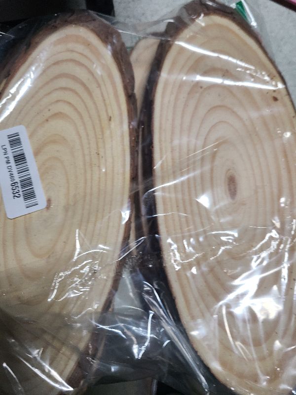 Photo 1 of 10 PCS Oval Wood Slices, Length 12 Inch and Width 3.9-4.7 Inch Craft Wooden Slices, Natural Unfinished Wood Slices for DIY Wedding