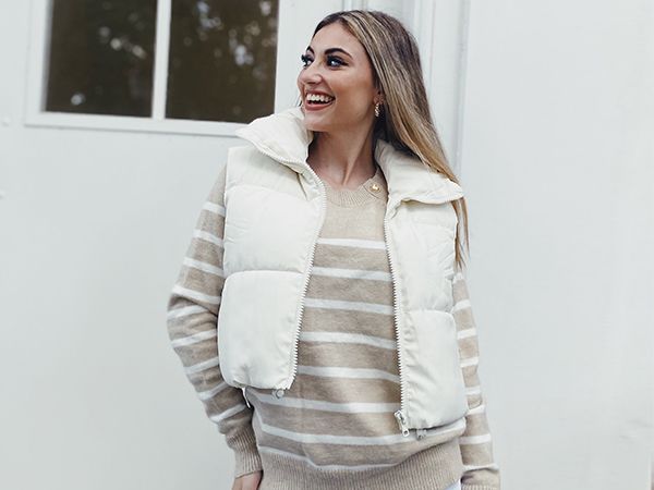 Photo 1 of **MINOR STAINS**
MEROKEETY Women's Crop Puffer Vest Stand Collar Sleeveless Zip Up Lightweight Fall Padded Gilet Coat,White,XL