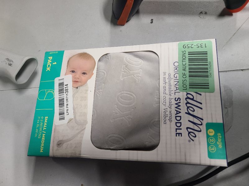 Photo 1 of SwaddleMe by Ingenuity Original Swaddle in Velboa - Size Small/Medium, 0-3 Months, 1-Pack (Hugs & Kisses)
