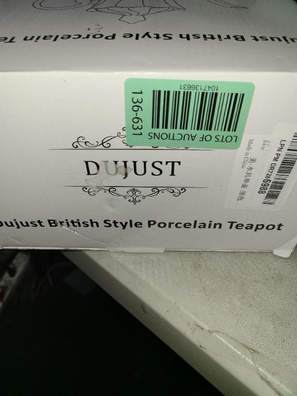 Photo 1 of DUJUST British Style Porcelain Teapot (40oz), Luxury Ceramic Teapot with Golden Trim, Food Grade Teapot with Built-in Filter, Beautiful Teapot for Tea Party & Home Décor-Black