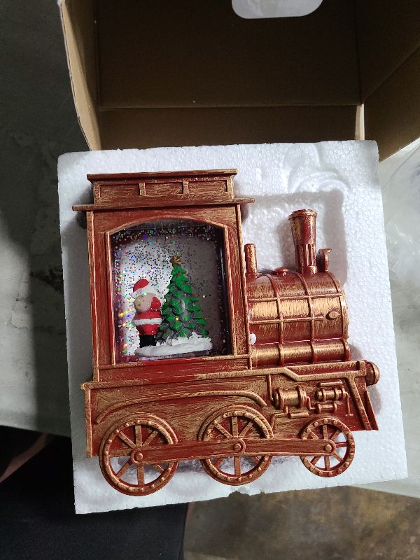Photo 1 of Christmas Snow Globe Lantern with Santa Cute Dog Projection Vintage Train Lighted Snow Globe Musical Water Globe Lantern Swirling Glitter Decoration for Christmas Home Holiday Decor(Santa Train)