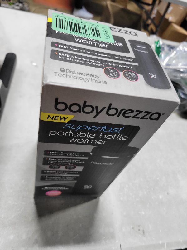 Photo 1 of Baby Brezza Superfast Portable Baby Bottle Warmer – 50% Faster - Travel Breastmilk Warmer and Formula Warmer - Safe, Even Heating - Up to 9oz - No Adapters, Black