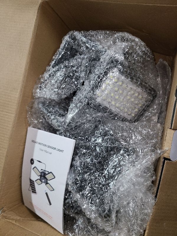 Photo 1 of Latband Solar Shed Light Outdoor Indoor Solar Powered Motion Sensor Pendant Light,144LED 1200LM Daytime Work with 5 Modes & Remote Control 4 Heads IP65 Waterproof for Garage Barn Shop 2 Pack
