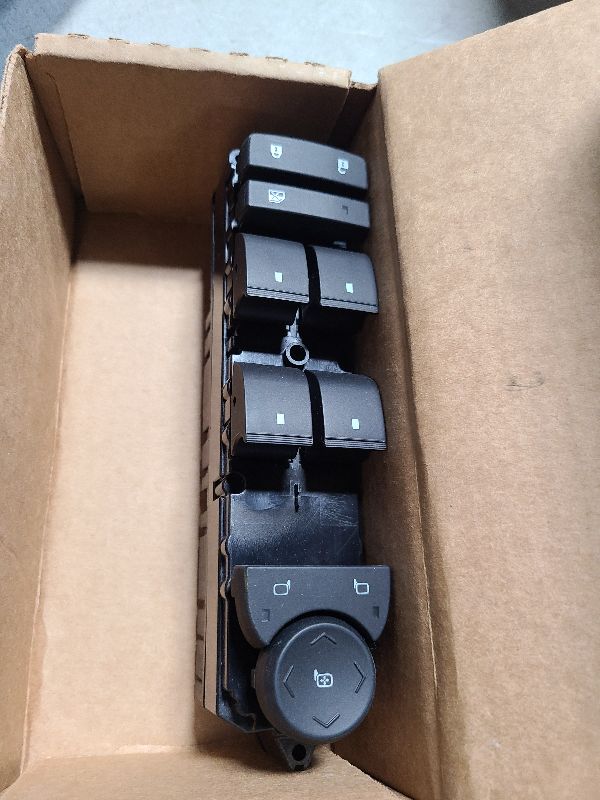 Photo 1 of General Motors GM Genuine Parts D1431H Driver Side Door Lock, Mirror, and Window Switch