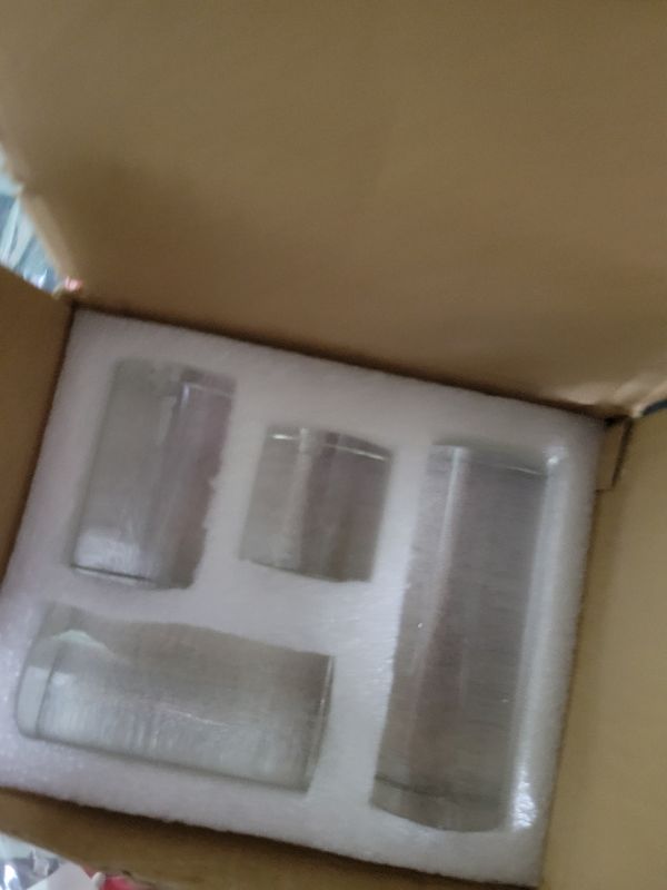 Photo 1 of ZEERSHEE 4-Pack Clear Glass Cylinder Display Risers Crystal Blocks Display Stand for Collectibles Art Craft Transparent Solid Bases for Jewelry Cosmetic Crafts Closet Show