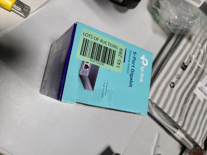 Photo 1 of TP-Link TL-SG105, 5 Port Gigabit Unmanaged Ethernet Switch, Network Hub, Ethernet Splitter, Plug & Play, Fanless Metal Design, Shielded Ports, Traffic Optimization,Navy Blue