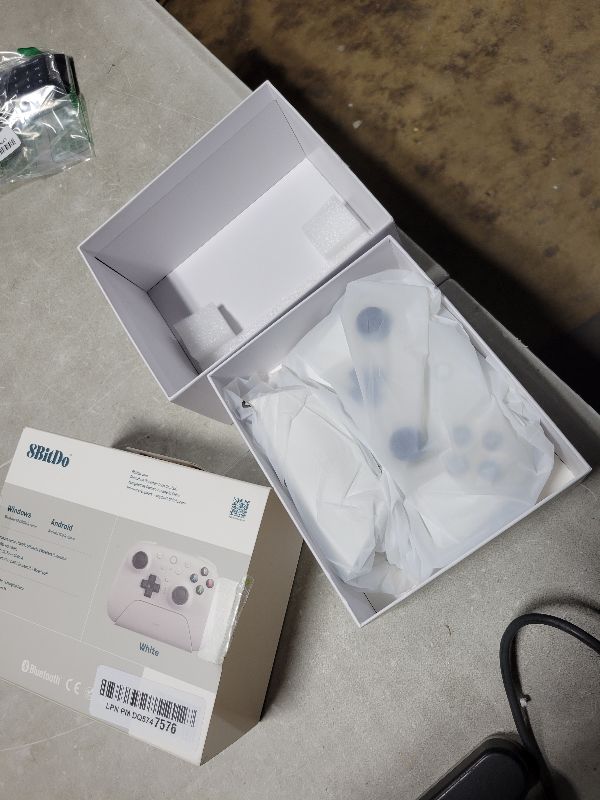 Photo 1 of 8BitDo Ultimate 2 Wireless Controller for Windows & Android, Gaming Controller with TMR Joysticks, Switchable Hall Effect/Tactile Triggers, RGB Fire Ring, 8Speed Wireless Tech, White