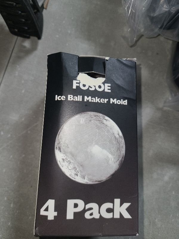 Photo 1 of Silicone Ice Ball Molds for Whiskey - Set of 4 Round Makers with Lids for Cocktails, Bourbon, and Drinks