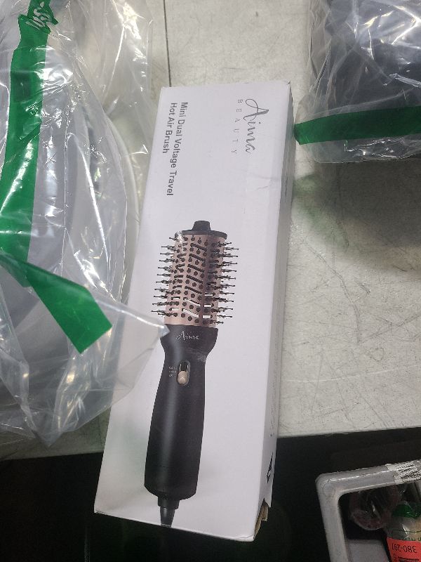 Photo 1 of Aima Beauty 4 in 1 Worldwide Travel Hot Air Brush Dual Voltage Blowout Brush Oval Shape One Step Hair Volumizer Straightener Blow Dryer Brush Negative Ionic Lock Moisture Gift 360° Swivel Cord Black
