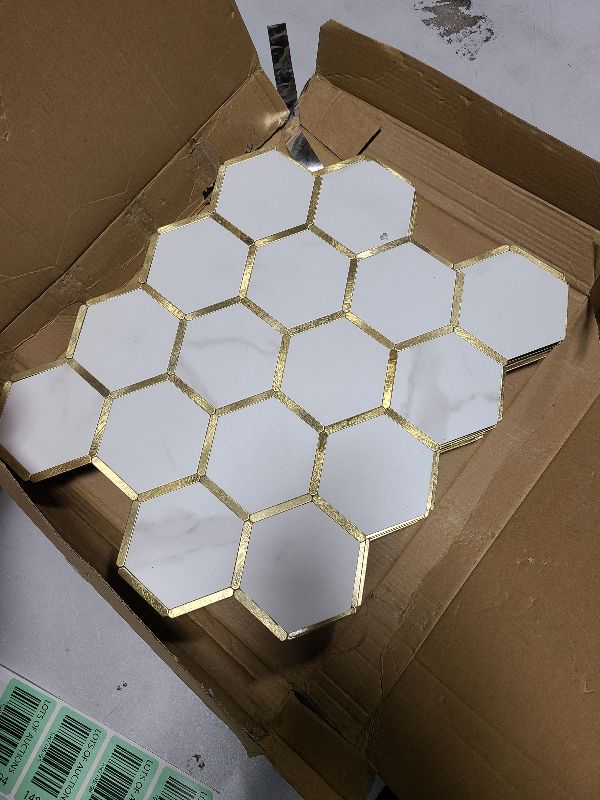 Photo 1 of Diflart Peel and Stick Kitchen Backsplash Tiles Gold and White Hexagon PVC Wall Tile Faux Marble for Kitchen Bathroom Pack of 10 Sheets