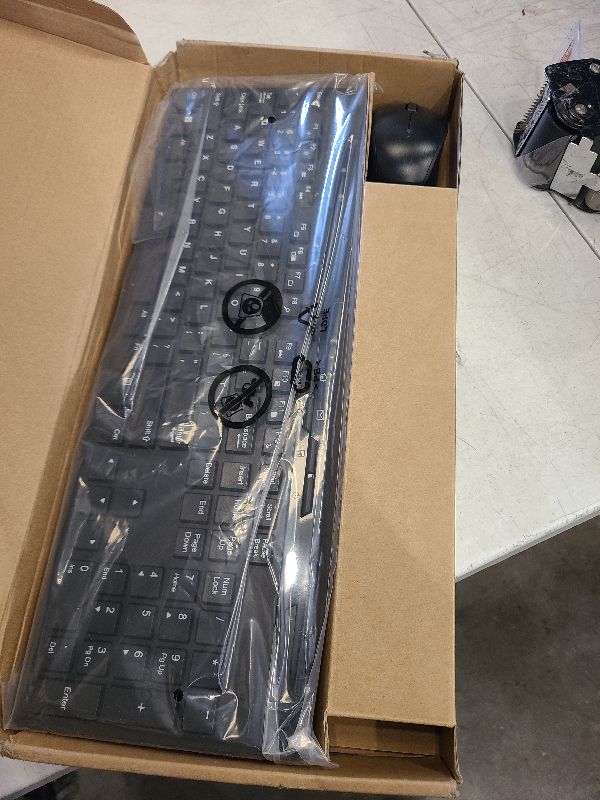 Photo 1 of Amazon Basics Wireless Keyboard and Mouse Combo, Full-Sized, QWERTY Layout, 2.4 GHz USB Receiver, Black