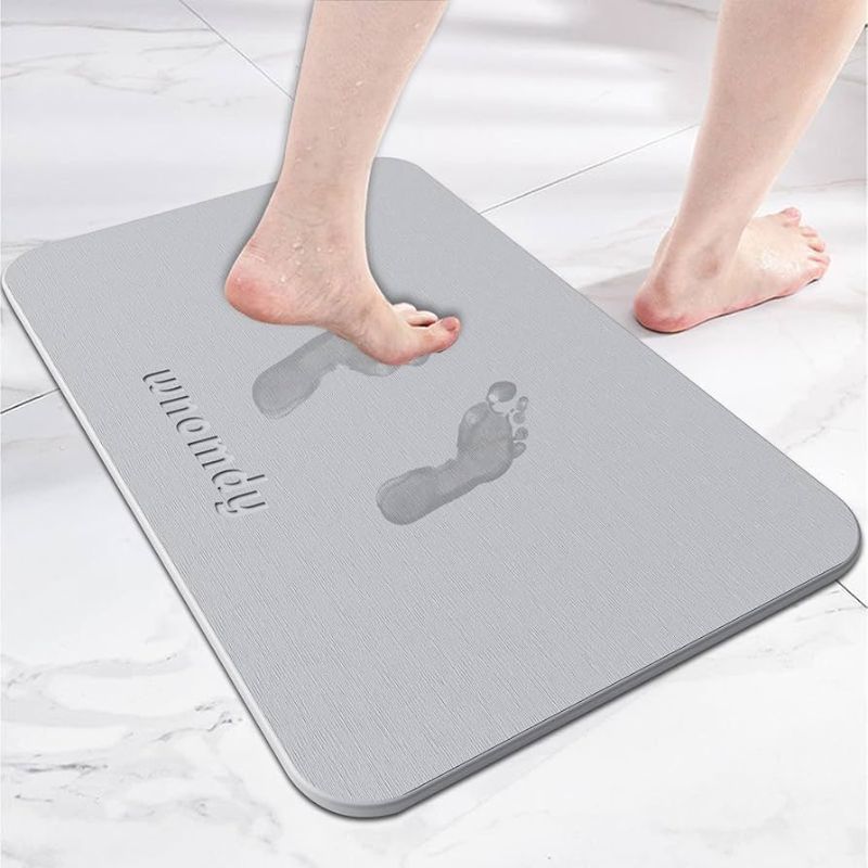 Photo 1 of 
Brand: WNOMDY
5.0
5.0 out of 5 stars
(4)
WNOMDY Bath Stone Mats Diatomaceous Earth Bath Mat Fast Water Drying Super Absorbent Diatomite Mat with Non-Slip for Bathroom Shower Floor,Kitchen Absorbent Pad,15.35x23.62inch,Light Grey,Hard 1-Pack 