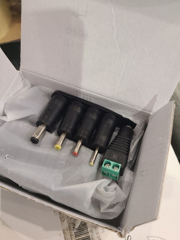 Photo 1 of 100V-240V to 24V 1A AC/DC Switching Power Supply Adapter with 5 Selectable Adapter Plugs