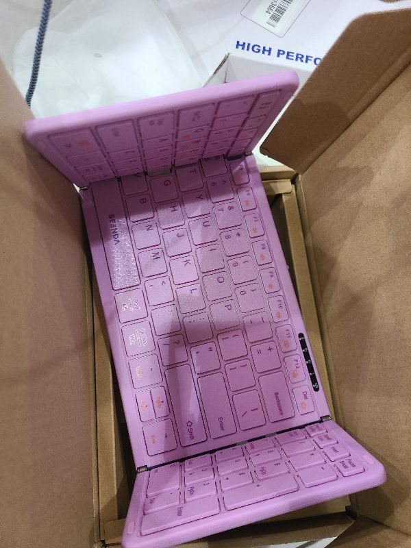 Photo 1 of seenda Foldable Bluetooth Keyboard for Travel, Portable Wireless Folding Keyboard with Number Pad, Full-Size Rechargeable Keyboard for Laptop Tablet PC Mac Windows iOS Android - Purple Pink